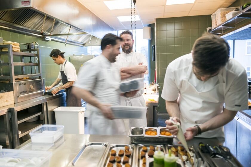 Chef´s at work in a kitchen.