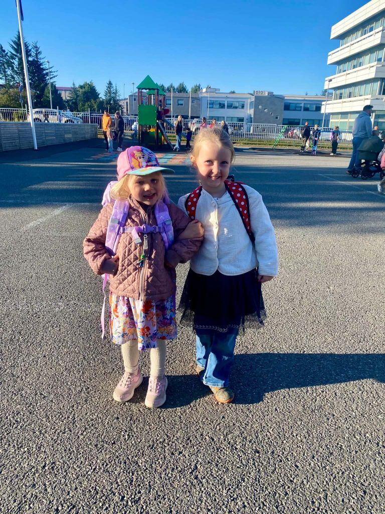 Iceland Makes Primary Schools Phone-Free Nationwide Two young girls with school bags on their first day at Ísaksskóli in Reykjavík